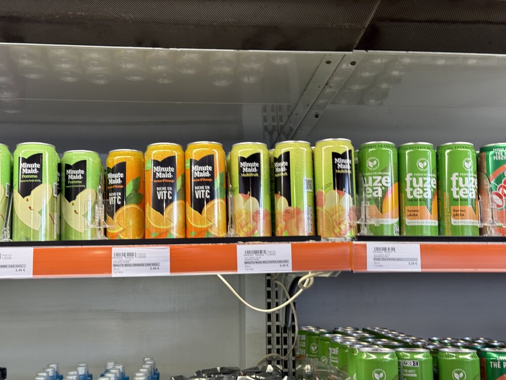 Linéaire canettes Fuze Tea/Oasis Ice Tea/Minute Maid — facing dense multi-parfums