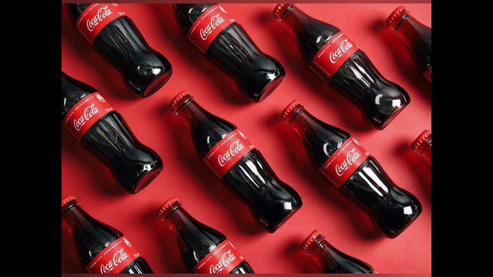 Packshots studio — Coca-Cola et Jack Daniel's, éclairage dramatique 3