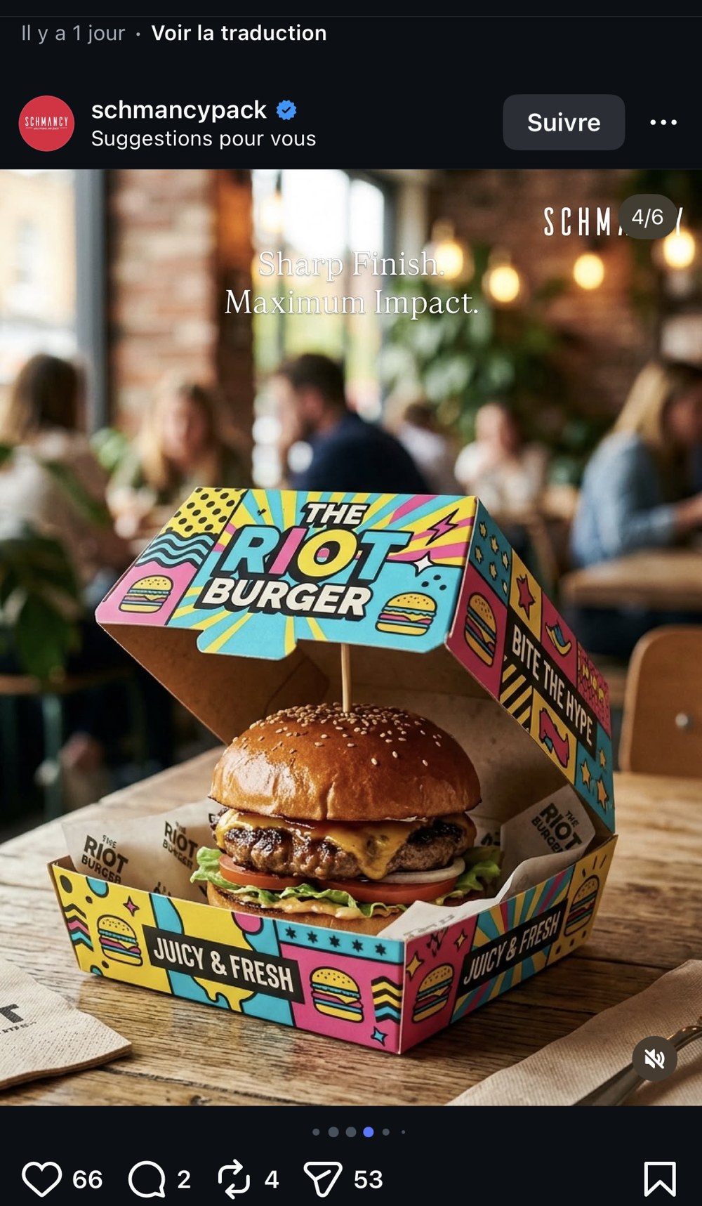 Schmancy Pack — box « The Riot Burger » ouverte, burger présenté sur pique en bois, tagline « Sharp finish. Maximum impact. »